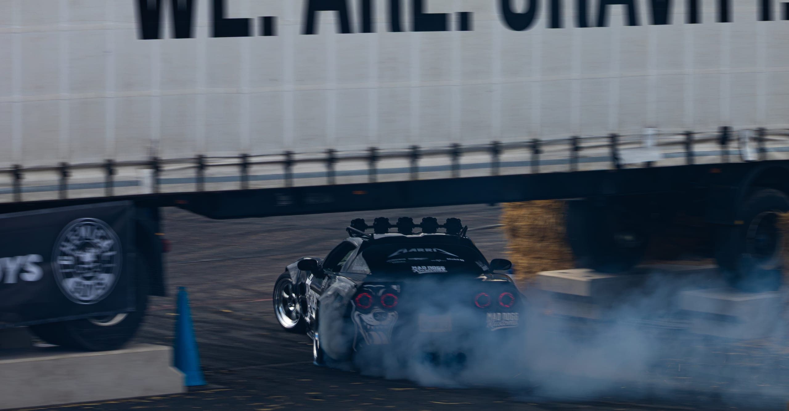 The rear of a drift car as it lights up the tyres, Gravity 2026