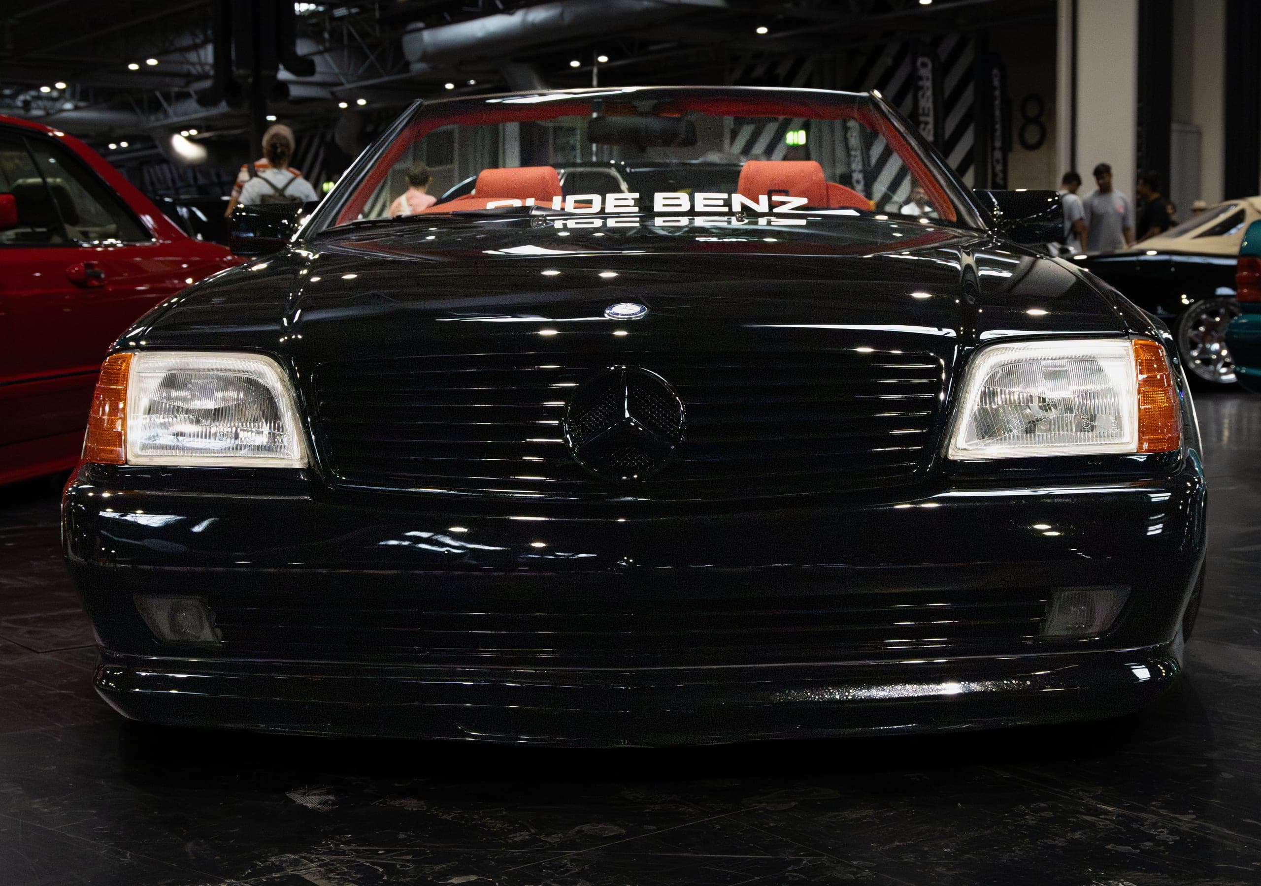 A close crop of a dark front grille and headlight, Gravity 2026