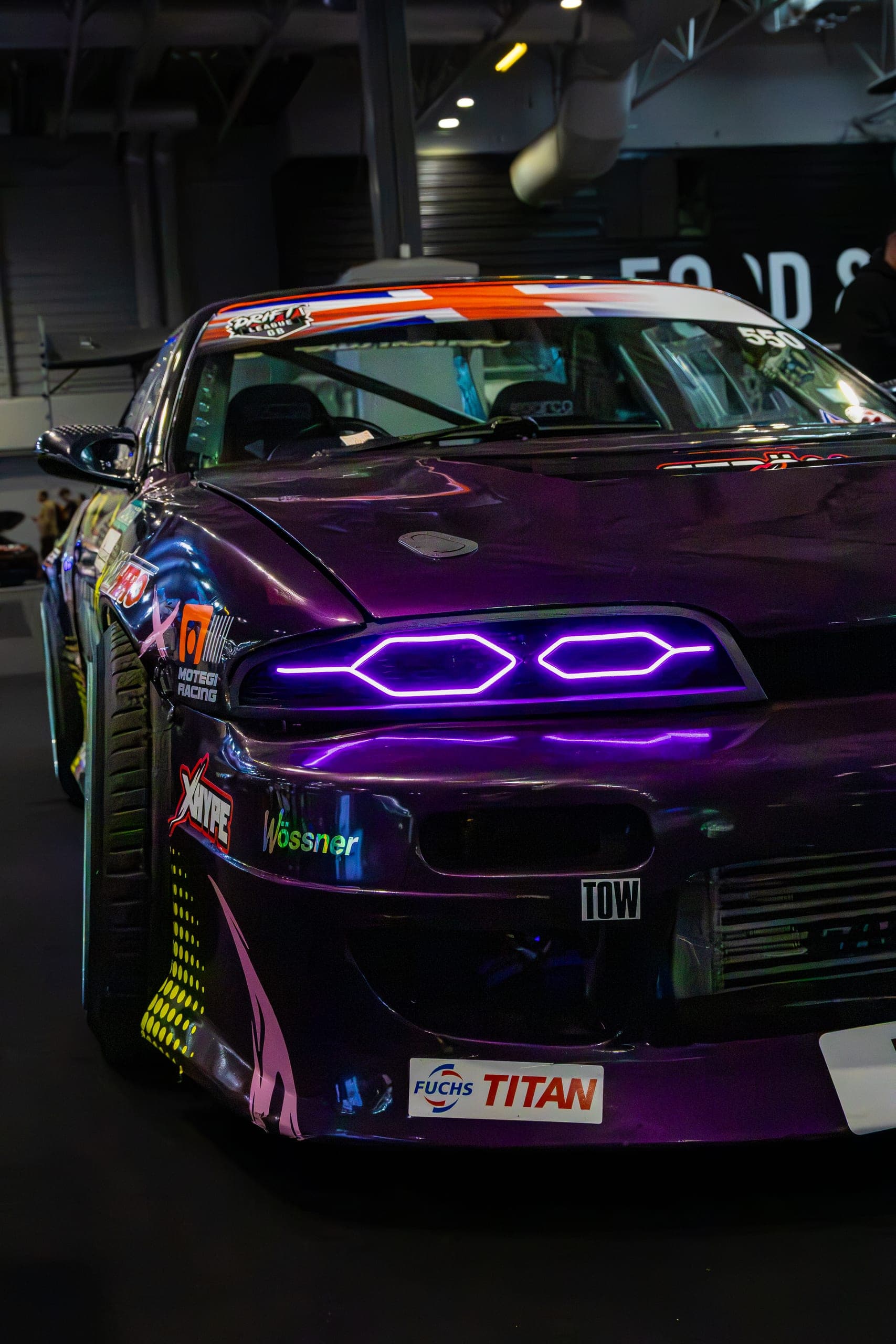 A show car with hexagonal LED headlights, front three-quarter, Gravity 2026