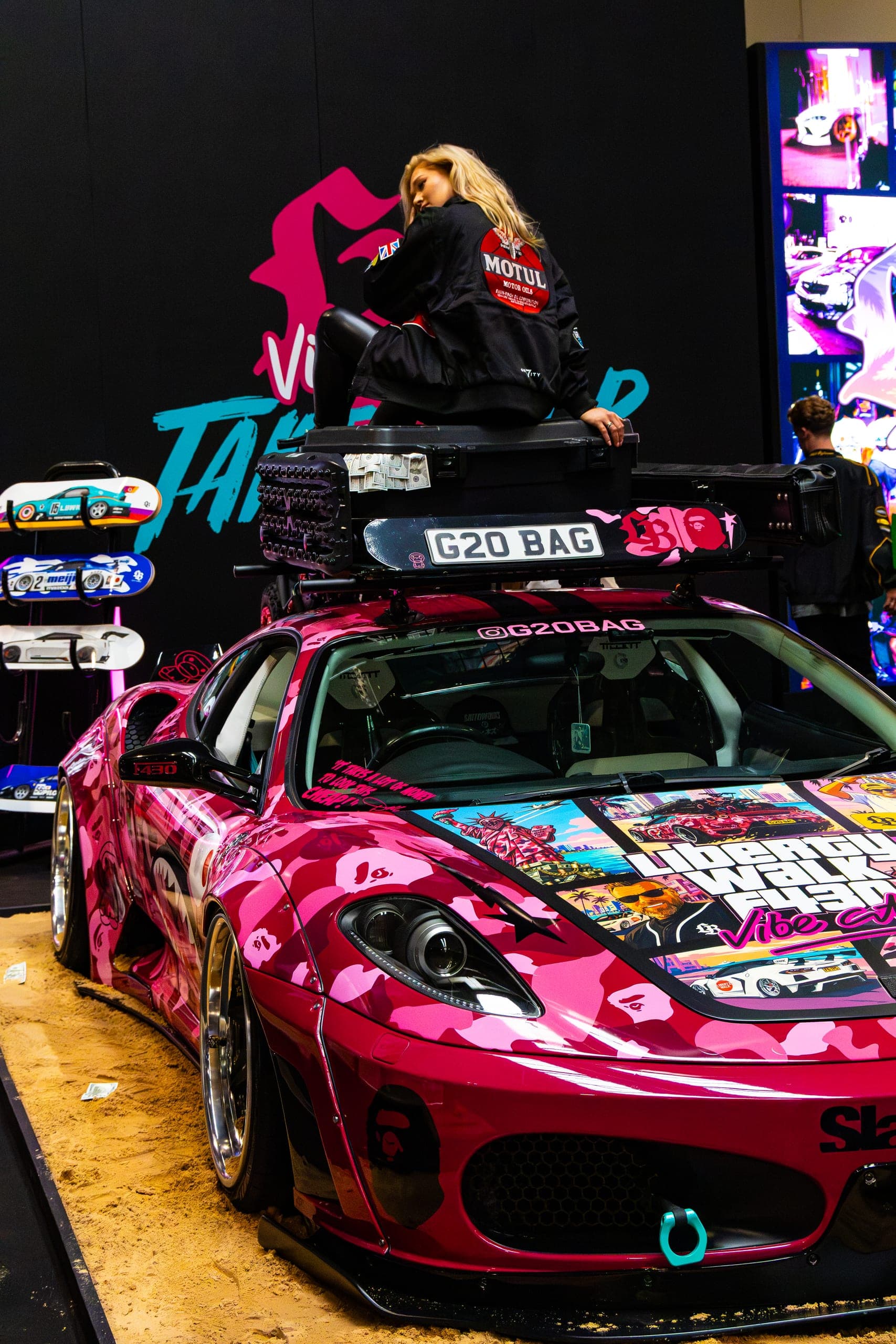 A graphics-wrapped itasha show car, Gravity 2026