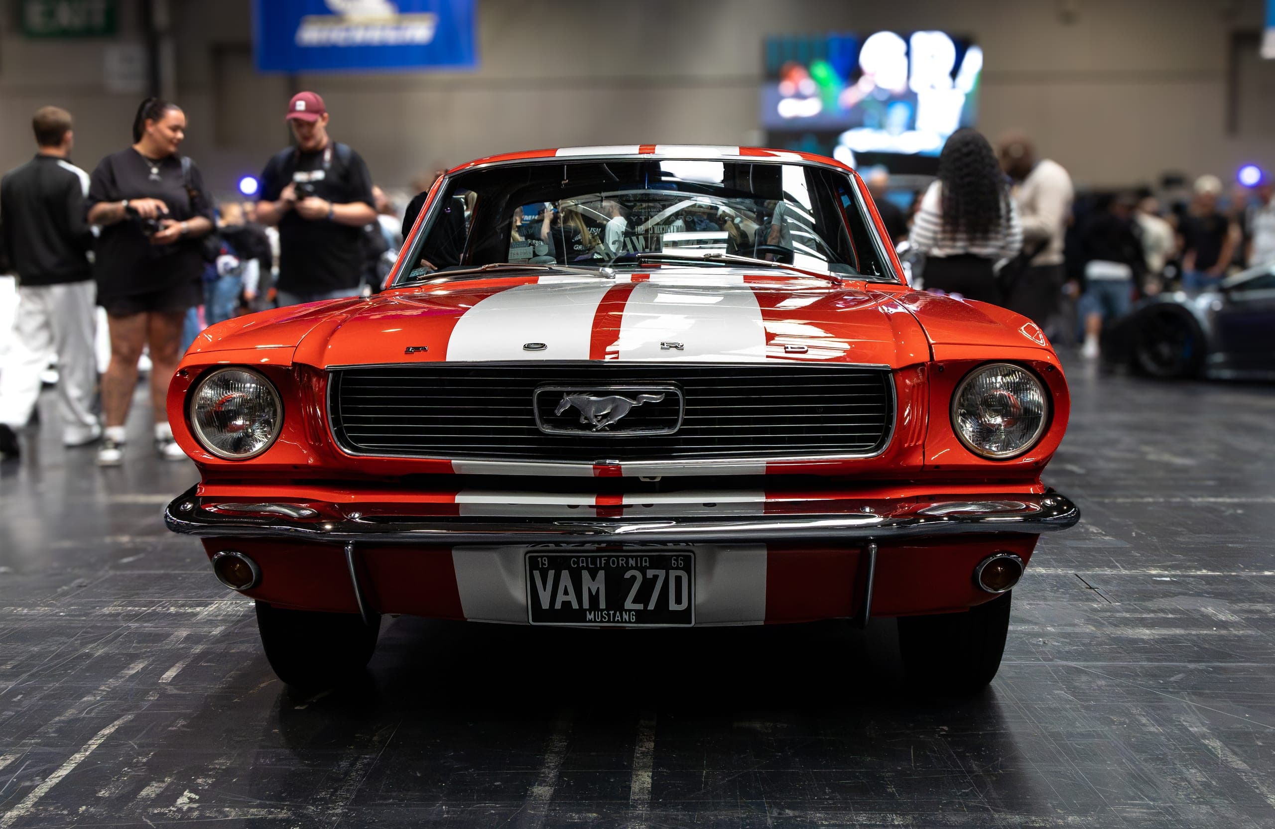 A red and white striped American muscle car, Gravity 2026